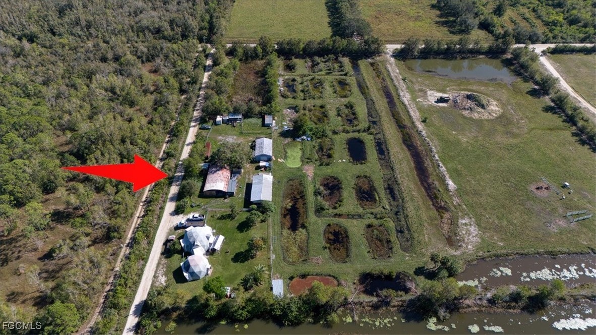 15871 Huffmaster Road North Fort Myers, FL 33917 - Photo 2 of 5 an aerial view of lake