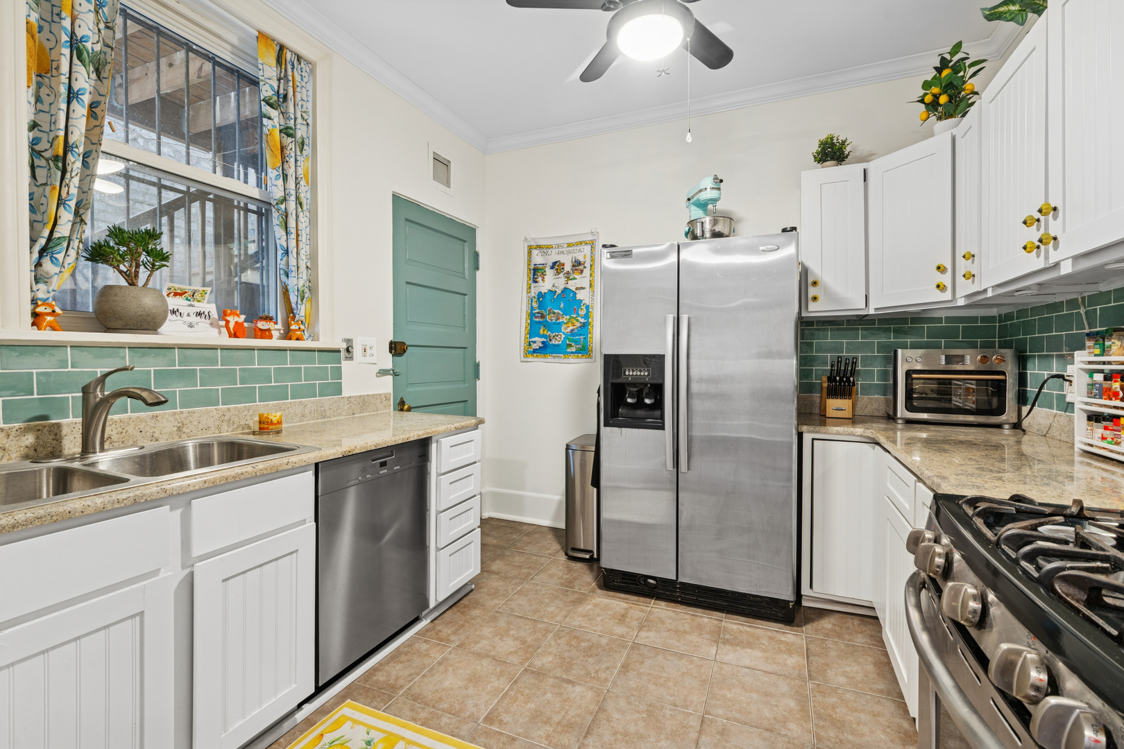 559 West Aldine Avenue, Unit 2 Chicago, IL 60657 - Photo 18 of 23 a kitchen with stainless steel appliances a refrigerator sink and stove