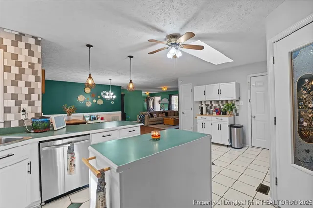 a bedroom with a bed a desk and chair