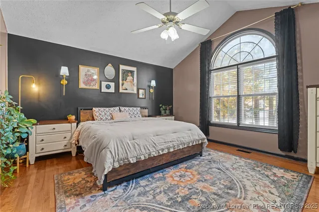 a view of a house with a tree