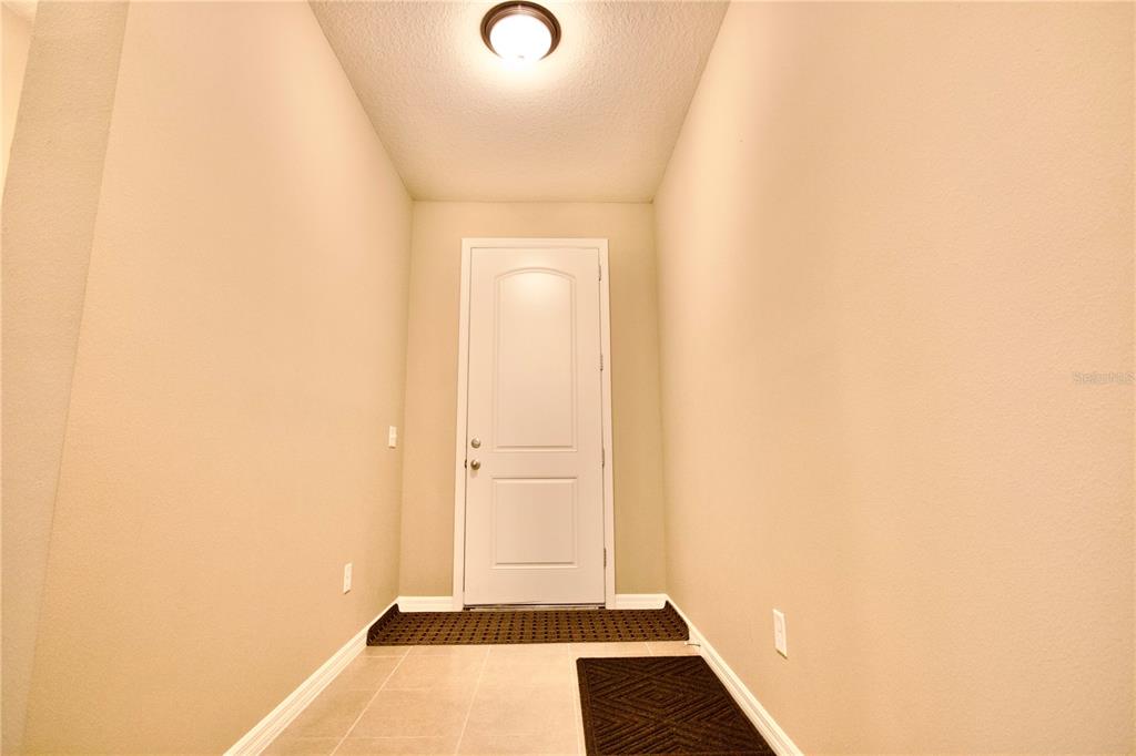 12343 Moss Lake Loop New Port Richey, FL 34655 - Photo 6 of 24 a view of an empty room