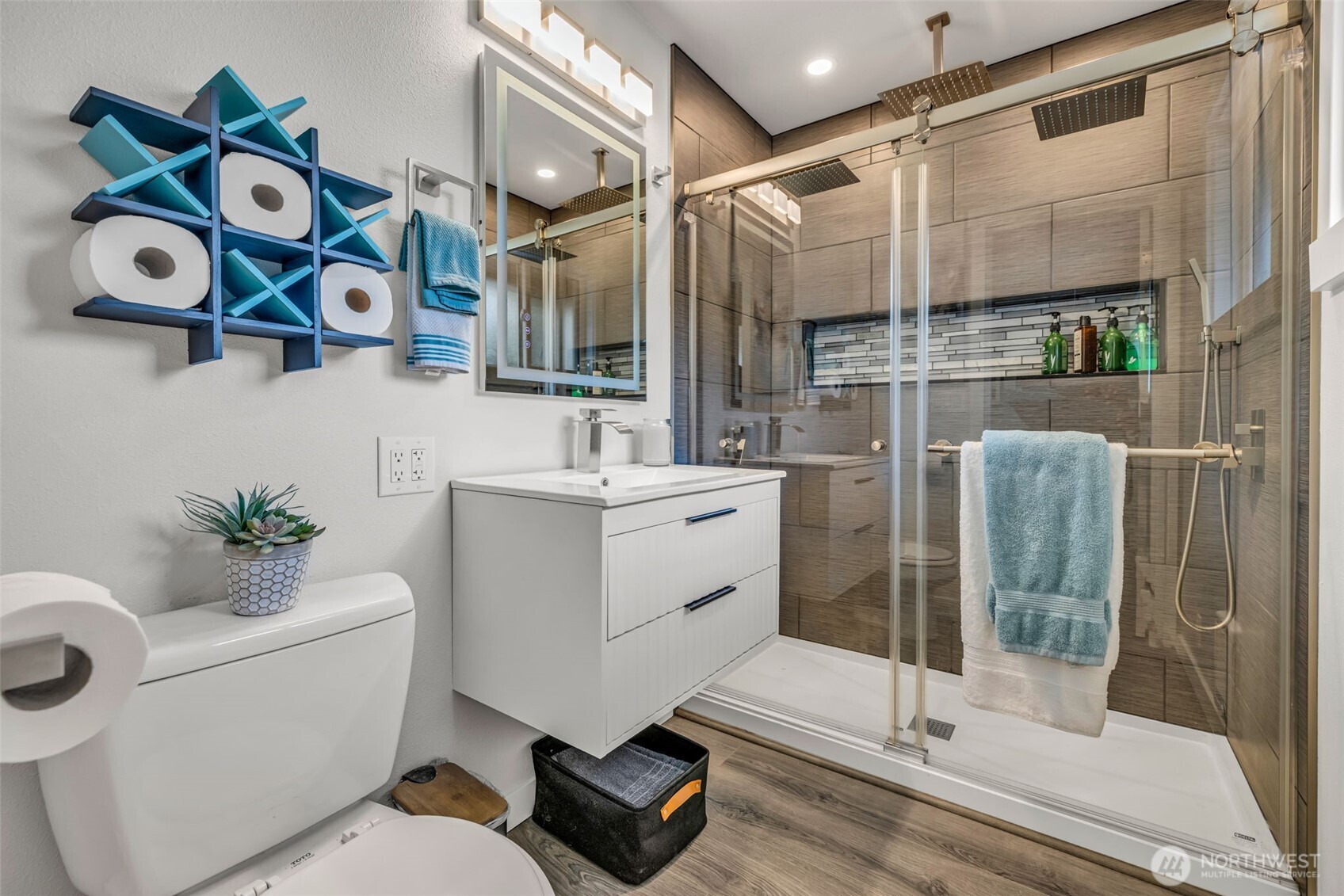 616 212th Street Southwest Bothell, WA 98021 - Photo 19 of 28 a bathroom with a sink toilet and shower