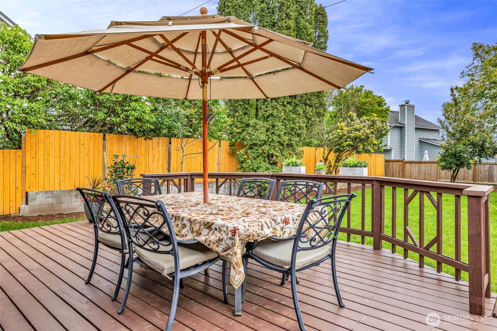 616 212th Street Southwest Bothell, WA 98021 - Photo 7 of 28 a view of a patio with furniture and umbrella