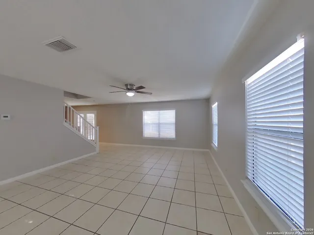 a view of an empty room and window