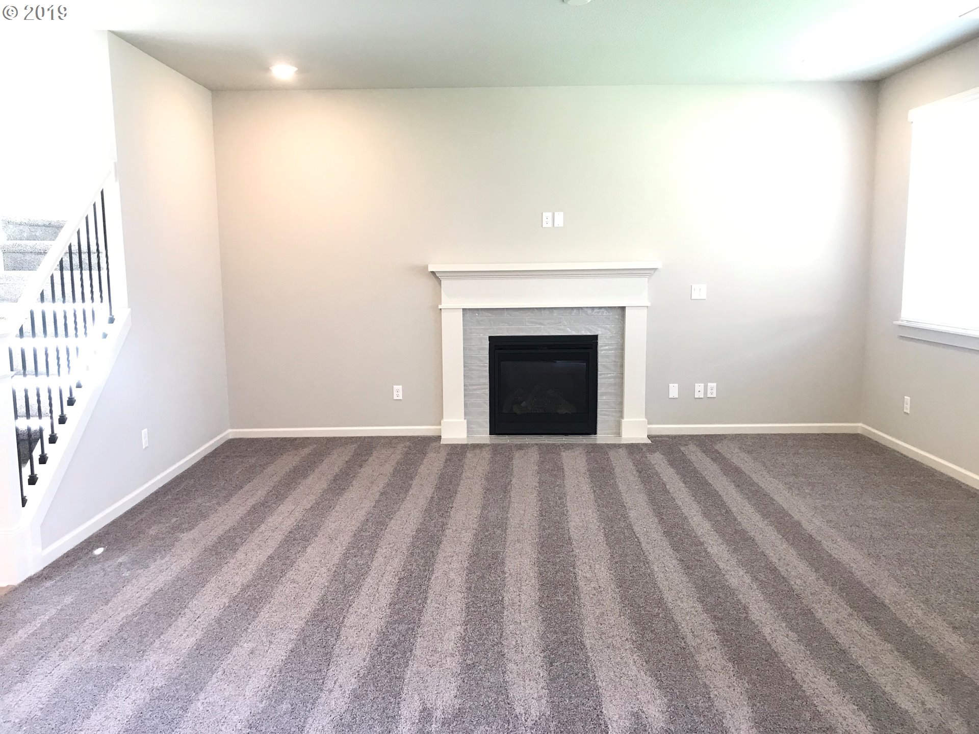 4099 Southwest Rodlun Road Gresham, OR 97080 - Photo 11 of 30 a view of empty room with a fireplace