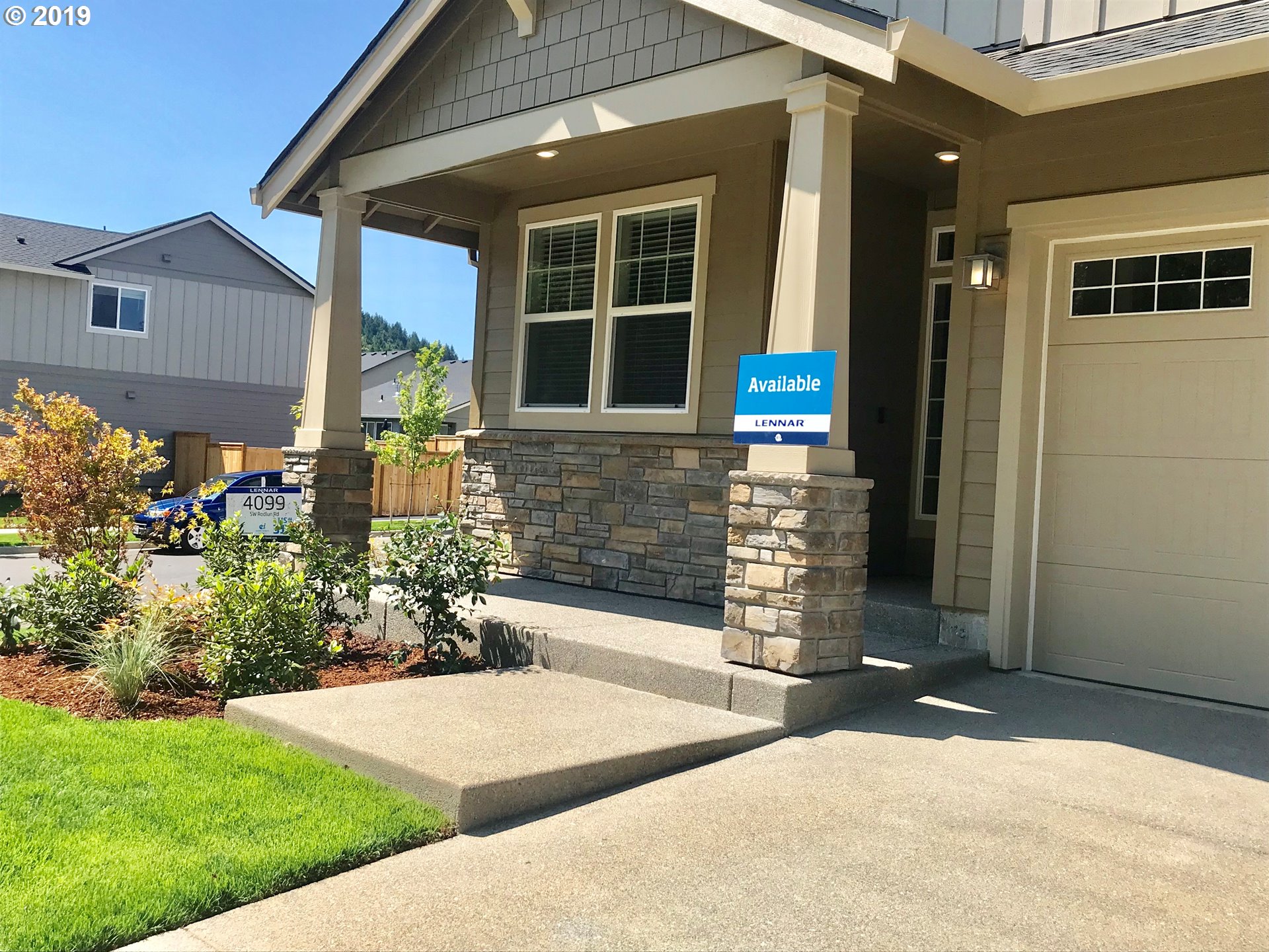 4099 Southwest Rodlun Road Gresham, OR 97080 - Photo 2 of 30 a front view of a house with a yard