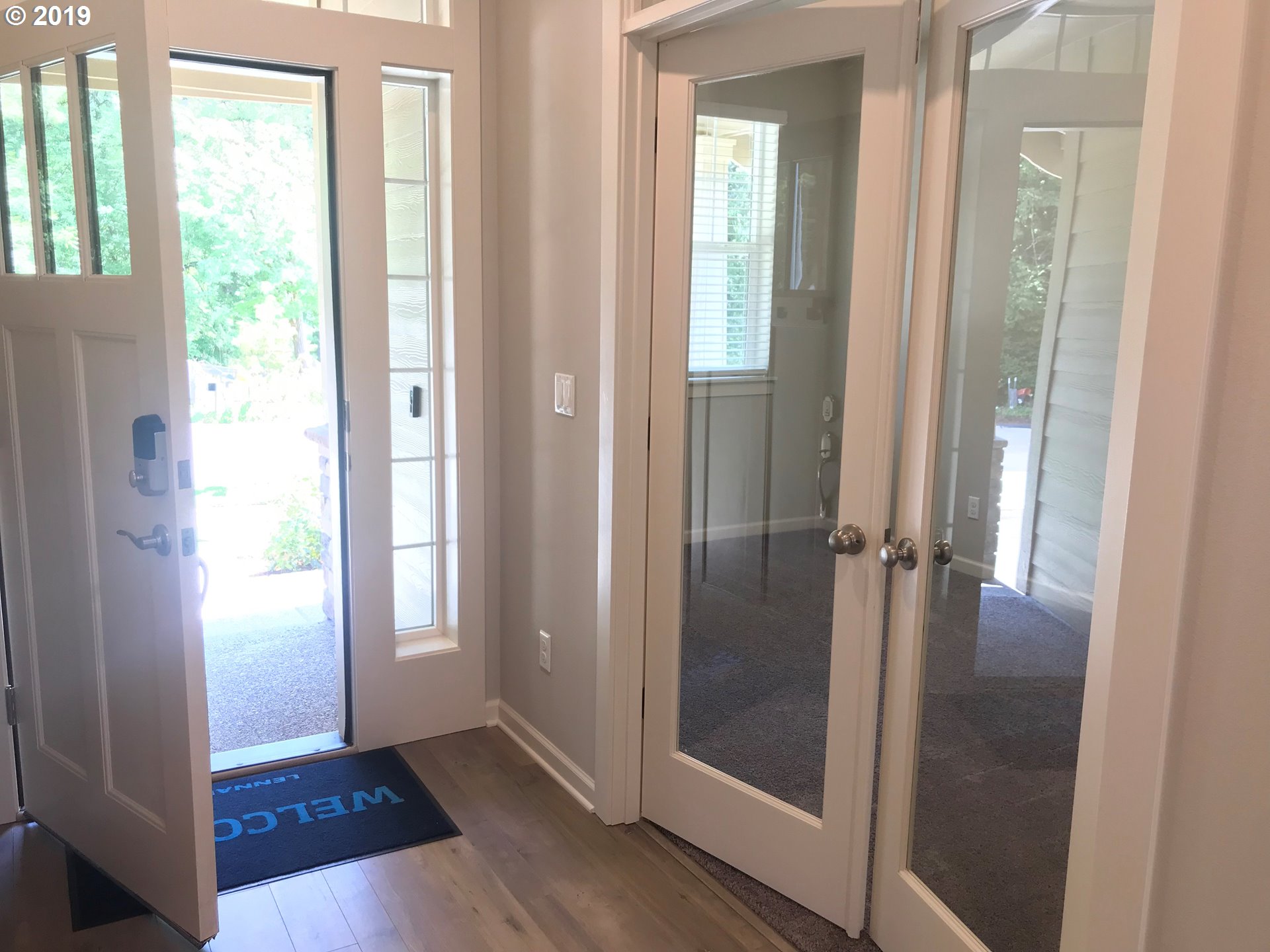 4099 Southwest Rodlun Road Gresham, OR 97080 - Photo 7 of 30 a view of a bathroom with a glass door