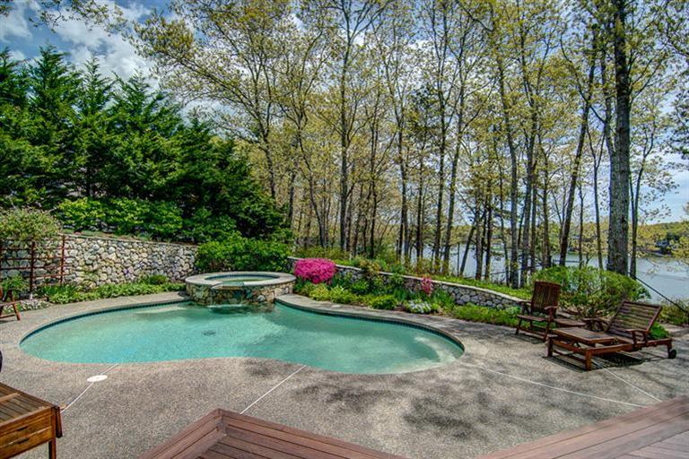 3 Harbor Ridge Road Mashpee, MA 02649 - Photo 7 of 34 a view of a table and chairs in the garden