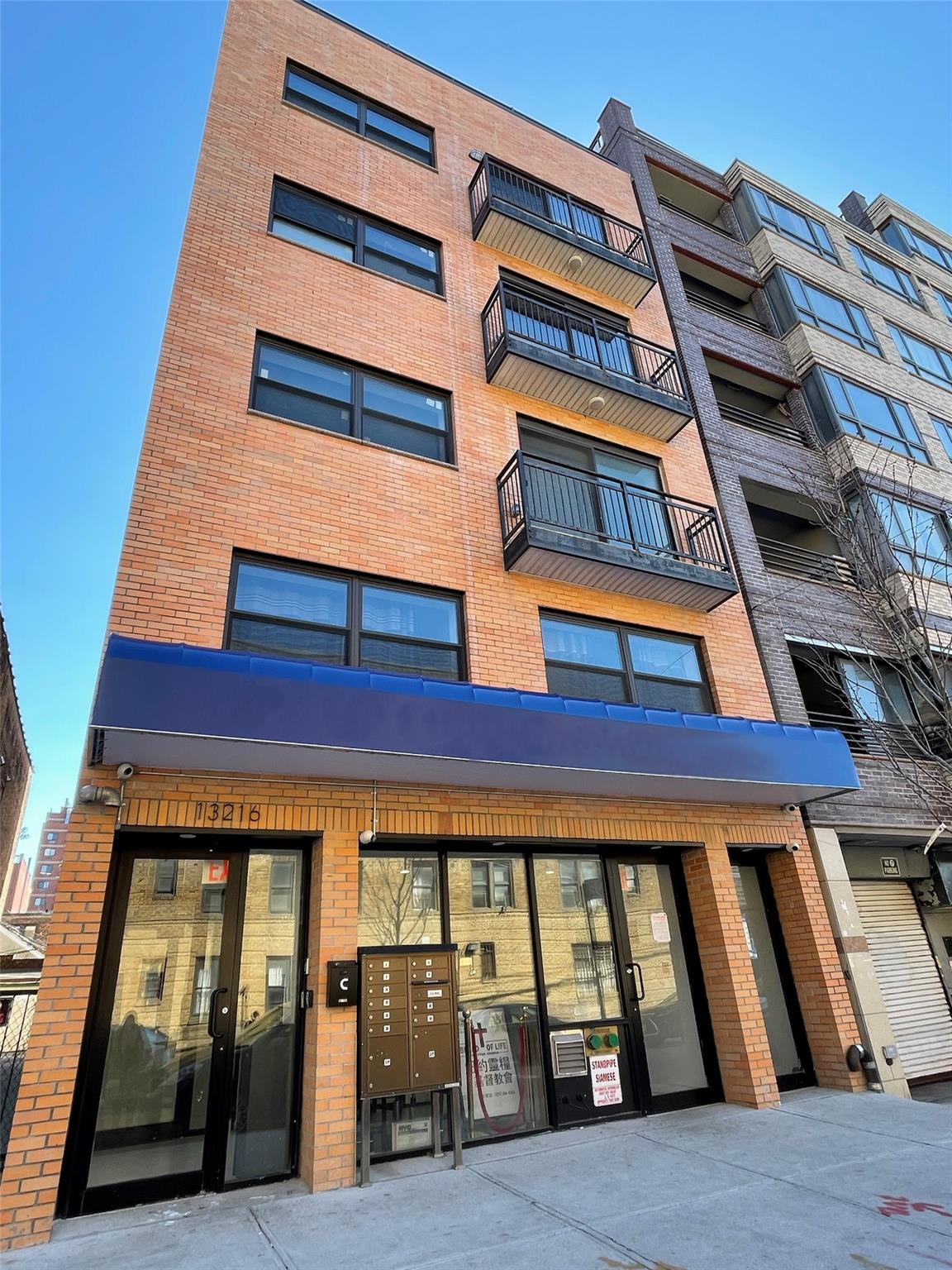 132-16 Maple Avenue, Unit 2B Queens, NY 11355 - Photo 1 of 11 a front view of a building