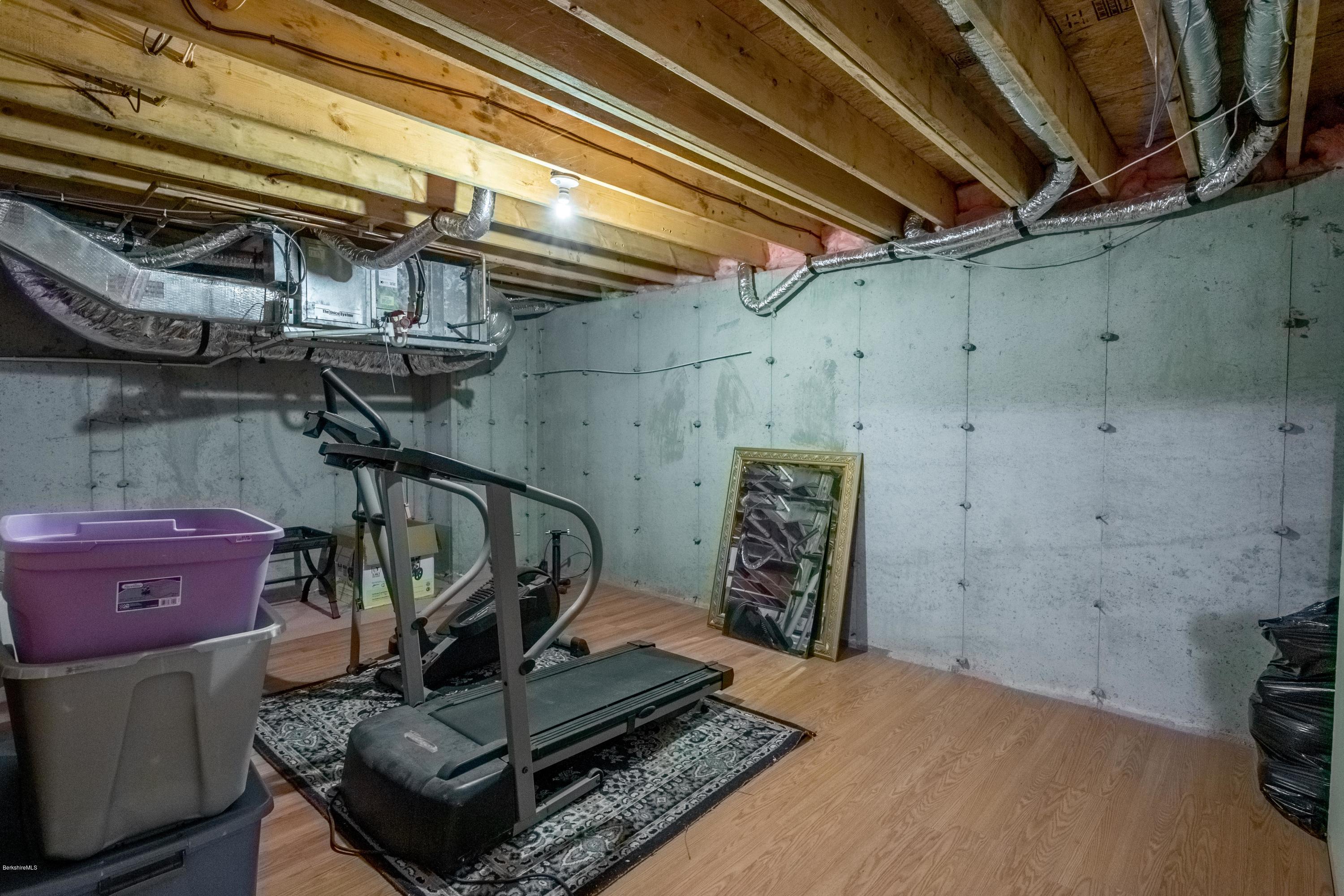 29 Valley View Road Becket, MA 01223 - Photo 28 of 36 a view of a room with gym equipment