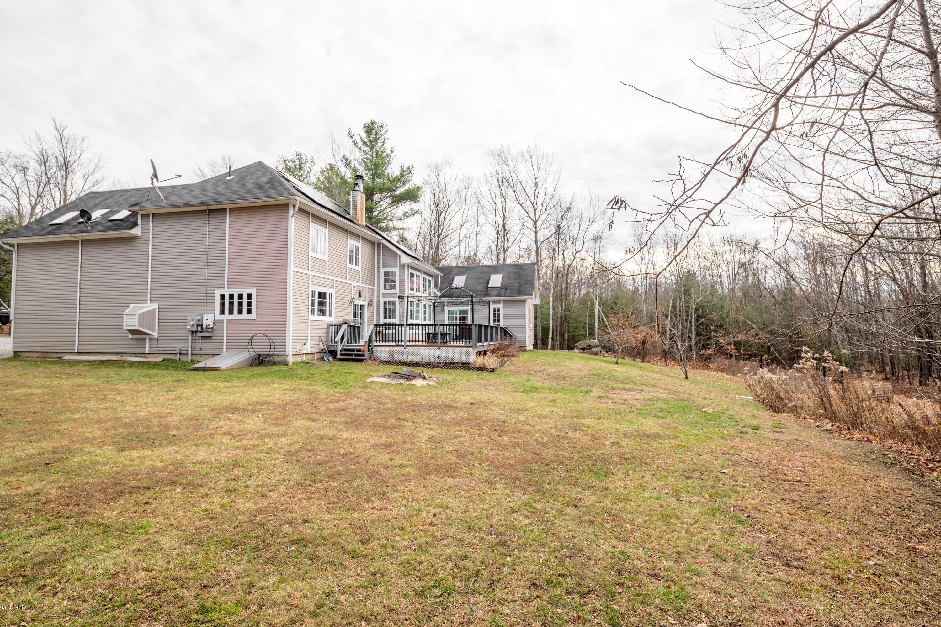 29 Valley View Road Becket, MA 01223 - Photo 35 of 36 a view of a house with basketball court