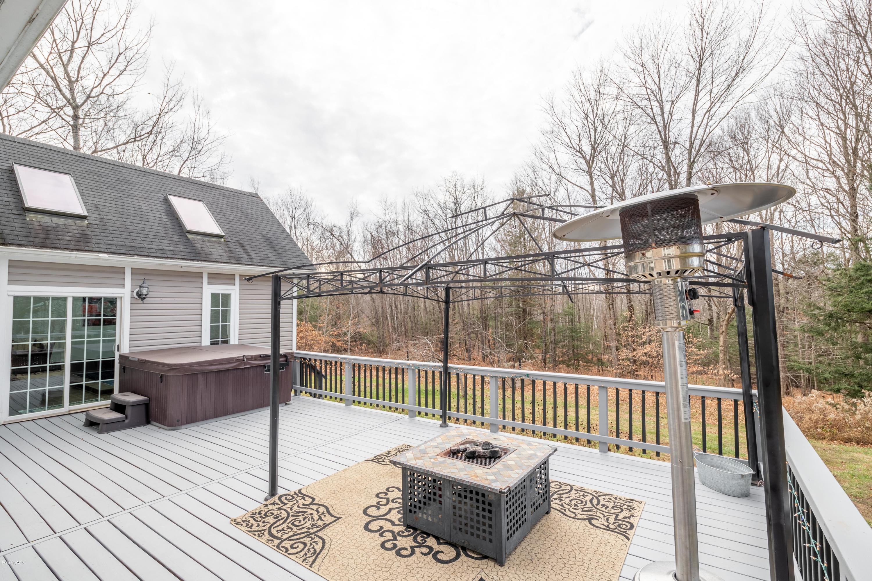 29 Valley View Road Becket, MA 01223 - Photo 5 of 36 a balcony with furniture and wooden floor