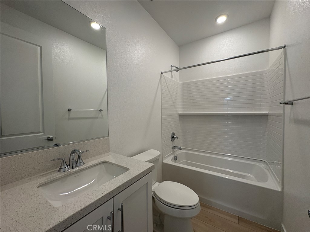 2540 Everly Street El Monte, CA 91733 - Photo 18 of 28 a bathroom with a granite countertop sink toilet and shower