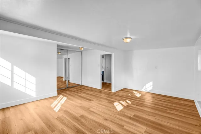 a view of an empty room and window