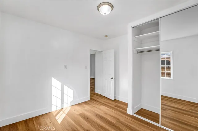 a view of an empty room and window