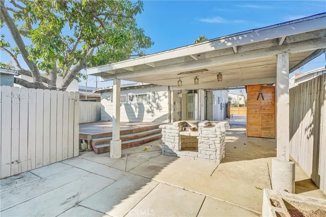 a view of a backyard of the house