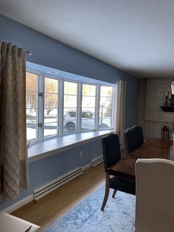 30 Hampton Knolls Road Holyoke, MA 01040 - Photo 14 of 38 a living room with furniture and a floor to ceiling window
