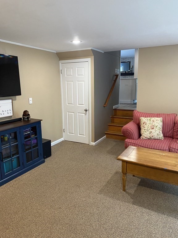 30 Hampton Knolls Road Holyoke, MA 01040 - Photo 22 of 38 a living room with furniture and a flat screen tv
