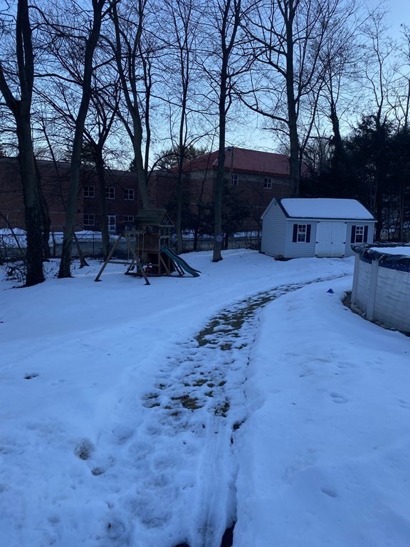30 Hampton Knolls Road Holyoke, MA 01040 - Photo 35 of 38 a backyard of a house with table and chairs