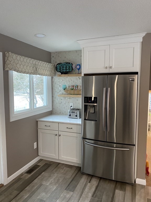 30 Hampton Knolls Road Holyoke, MA 01040 - Photo 10 of 38 a kitchen with stainless steel appliances a refrigerator sink and cabinets