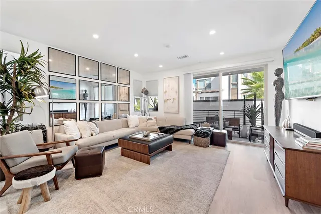 a living room with furniture or couch and a flat screen tv