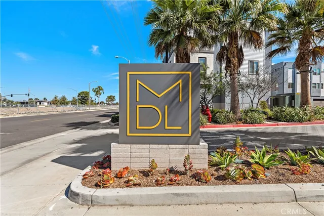 a view of a building with a road