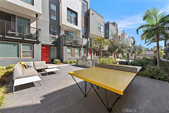 a view of an chairs and tables in the patio