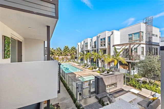 a view of a balcony with chairs