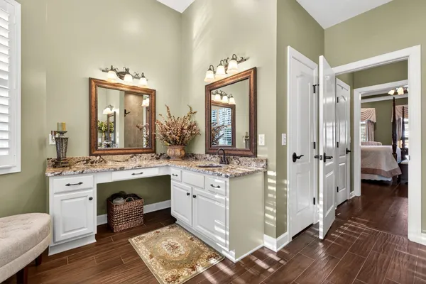 a view of living room with granite countertop furniture and fireplace
