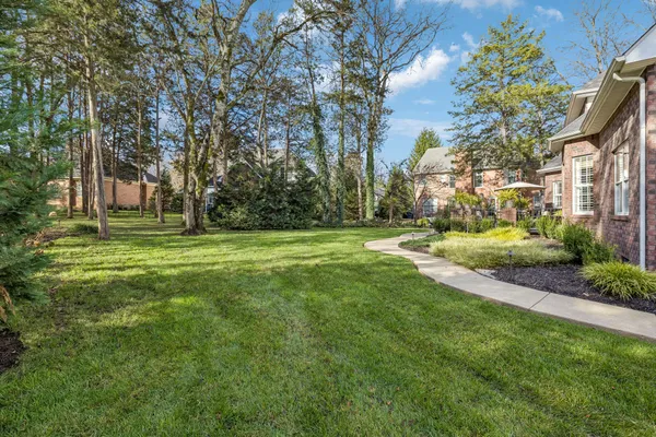 a view of a house with a big yard