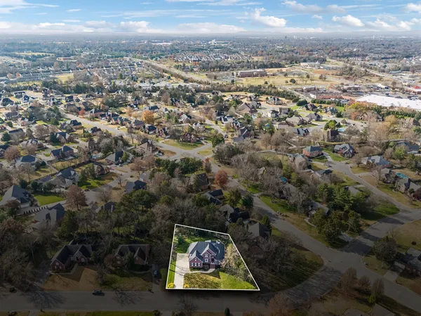 an aerial view of residential house with outdoor space