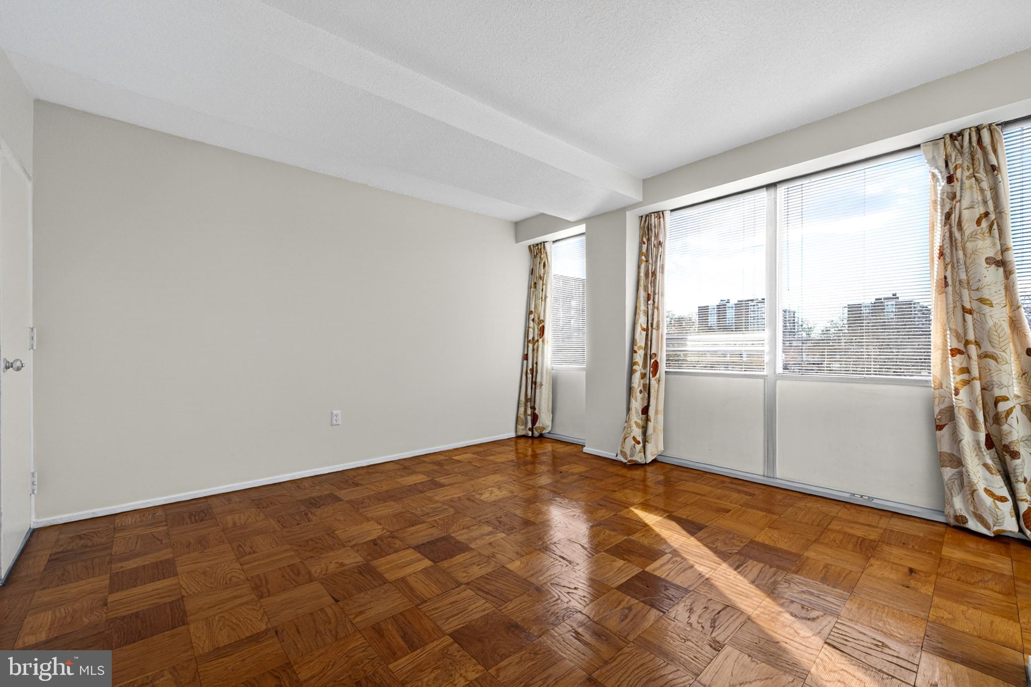 1311 Delaware Avenue Southwest Washington, DC 20024 - Photo 12 of 64 a view of empty room with wooden floor