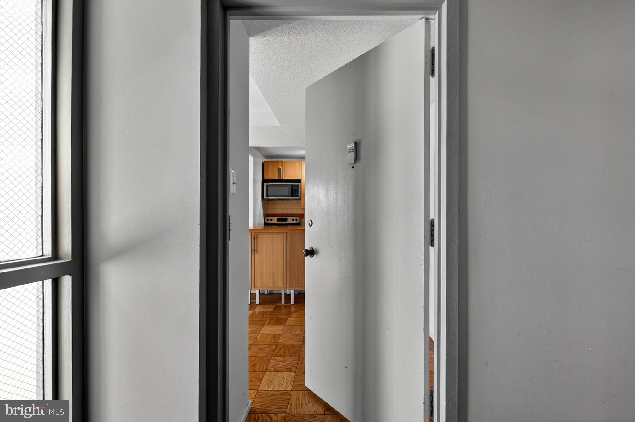 1311 Delaware Avenue Southwest Washington, DC 20024 - Photo 28 of 64 a view of a bedroom from a hallway