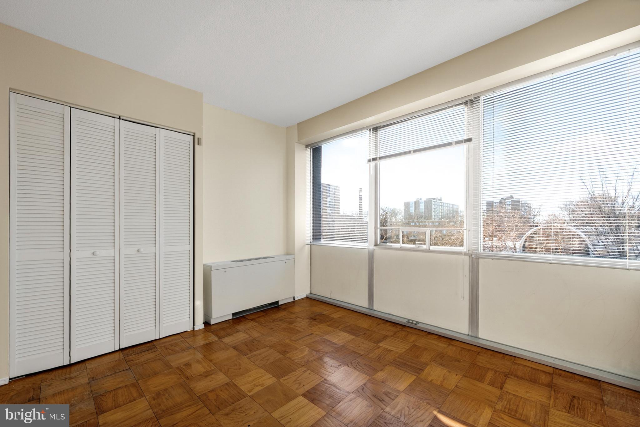 1311 Delaware Avenue Southwest Washington, DC 20024 - Photo 3 of 64 a view of a big room with wooden floor and windows