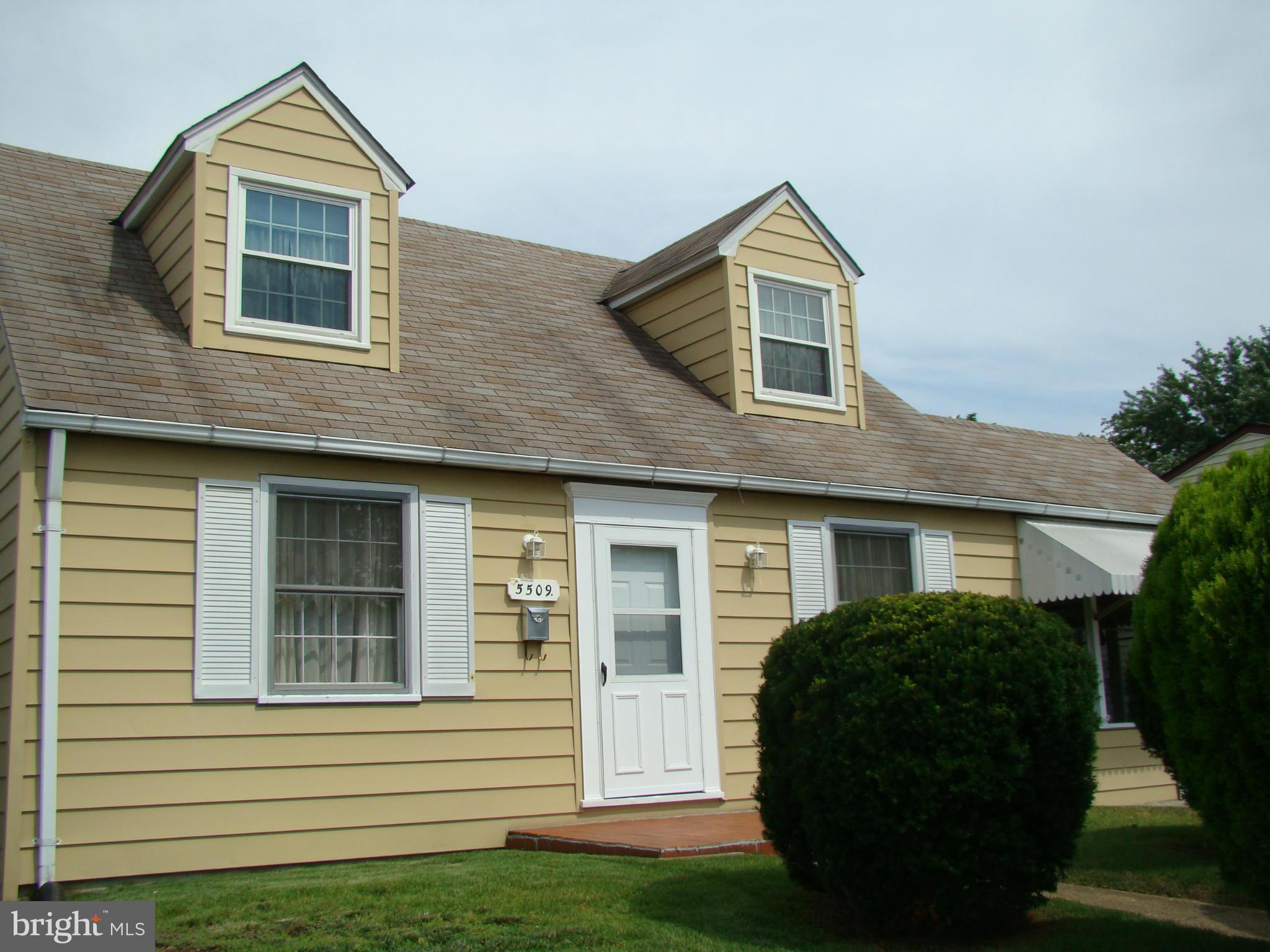 5509 Park Road Baltimore, MD 21225 - Photo 2 of 29 a view of a house with a yard and plants
