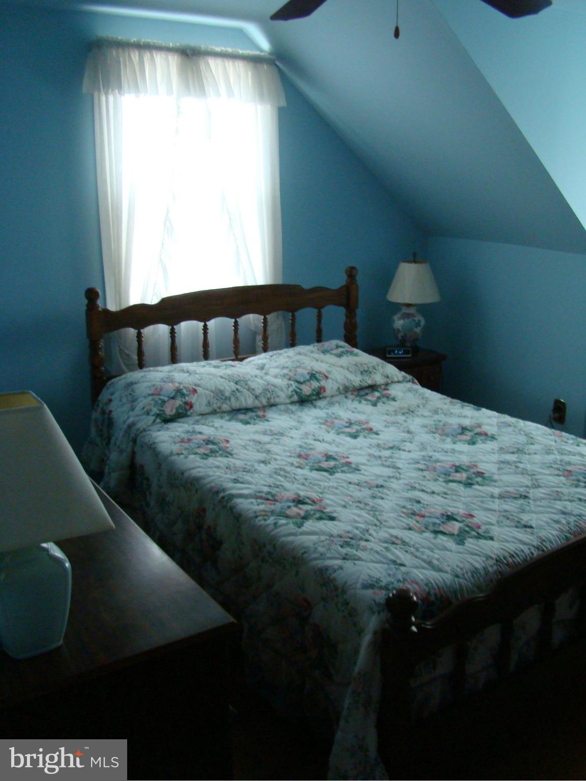 5509 Park Road Baltimore, MD 21225 - Photo 17 of 29 a bedroom with a bed and window