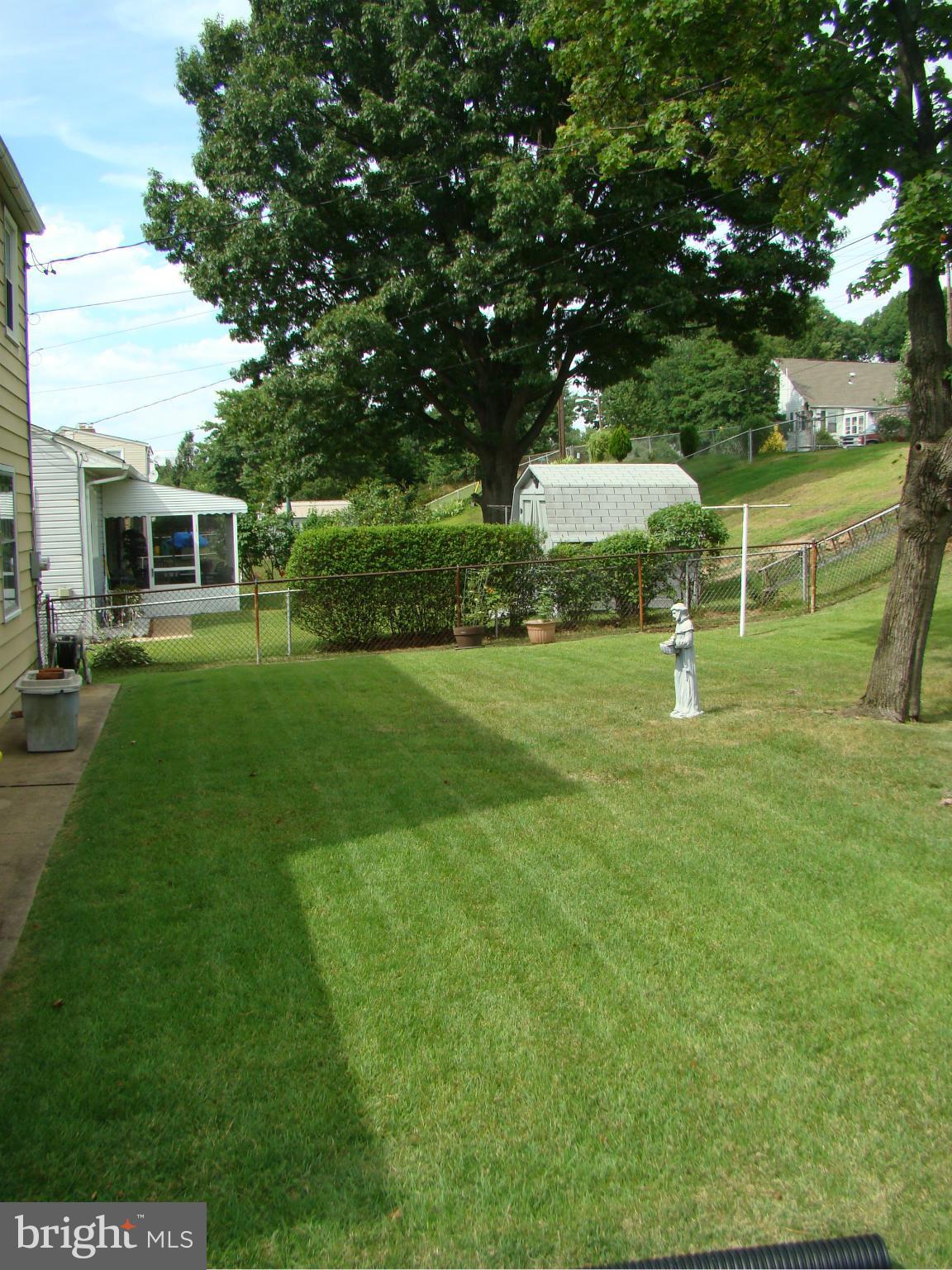 5509 Park Road Baltimore, MD 21225 - Photo 27 of 29 a view of a house with a backyard