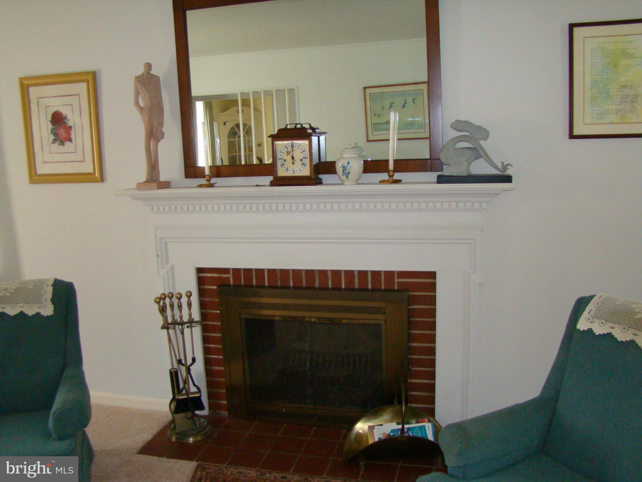 5509 Park Road Baltimore, MD 21225 - Photo 8 of 29 a living room with furniture and a fireplace