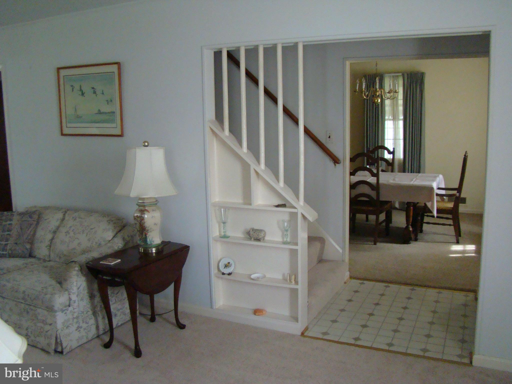 5509 Park Road Baltimore, MD 21225 - Photo 9 of 29 a living room with furniture and a painting on the wall