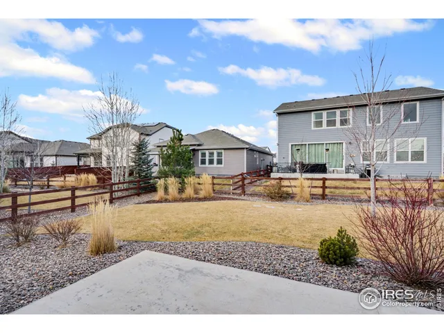 a view of a street with a building in the background