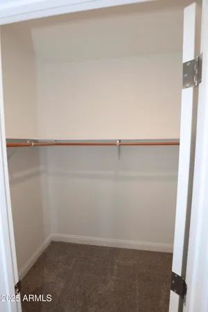 a view of small space with racks on the wall