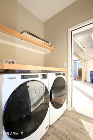 a utility room with a washer and dryer