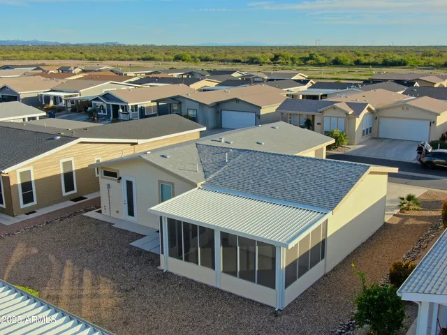 a view of a house with swimming pool