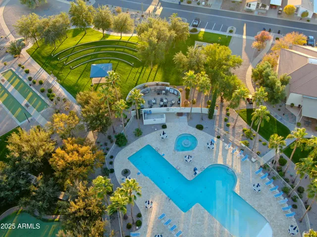 a view of a park with large trees
