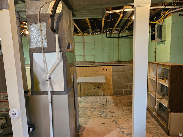 744 Royal Street Helper, UT 84526 - Photo 22 of 33 Unfinished basement featuring heating unit and water heater