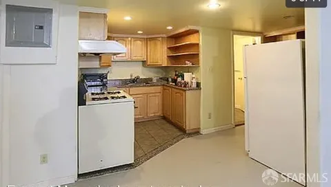 an empty room with wooden floor