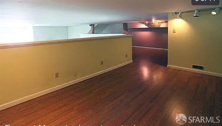 9 Grace Street San Francisco, CA 94103 - Photo 24 of 29 a view of empty room with wooden floor
