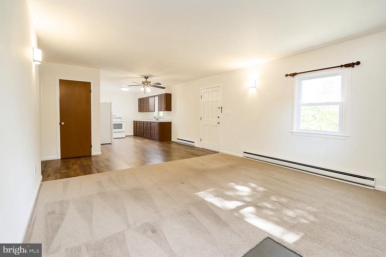 12102 Lucasville Road Manassas, VA 20112 - Photo 7 of 22 a view of empty room with wooden floor
