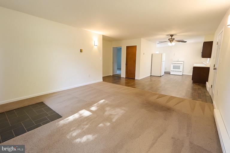 12102 Lucasville Road Manassas, VA 20112 - Photo 9 of 22 a view of a livingroom with a fireplace
