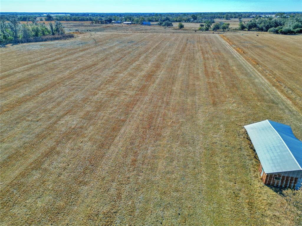 Cecil Durrance Road Zolfo Springs, FL 33890 - Photo 4 of 7 a view of a terrace with wooden floor